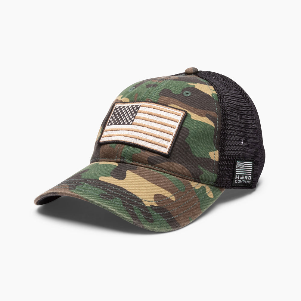 The Hero Company American Flag Hat - Camo - Helps Pair Veterans With A Service Dog or Shelter Dog