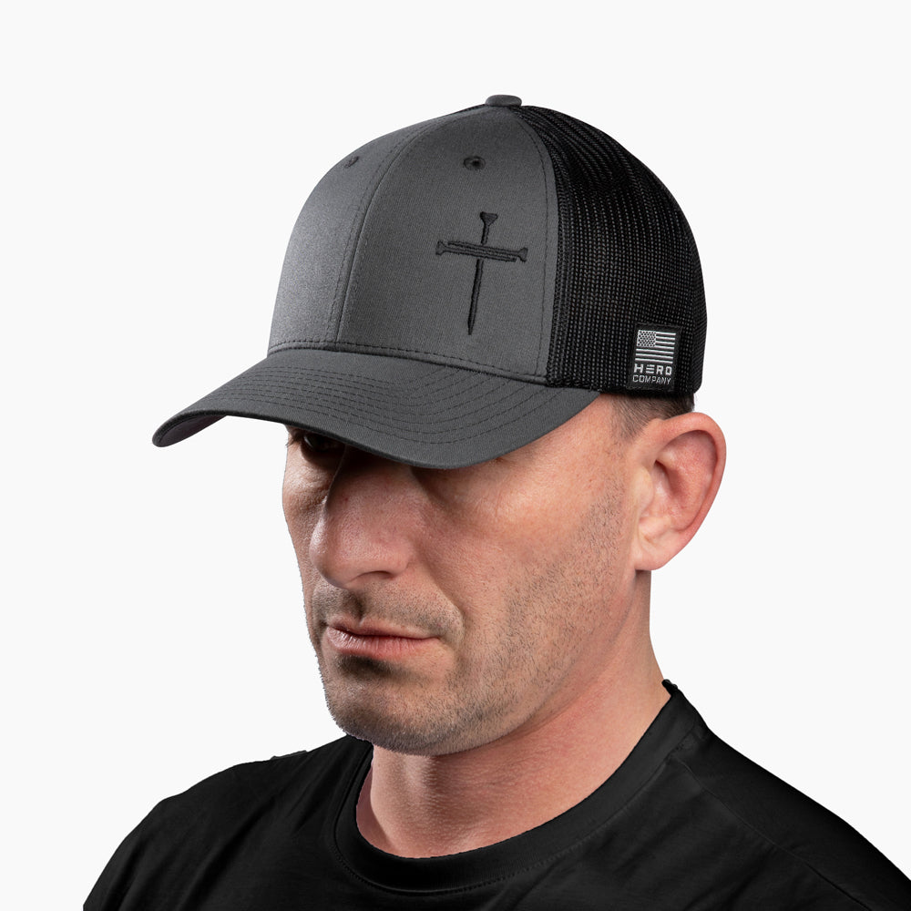 The Hero Company Cross of Nails Hat - Charcoal - Helps Pair Veterans With A Service Dog or Shelter Dog