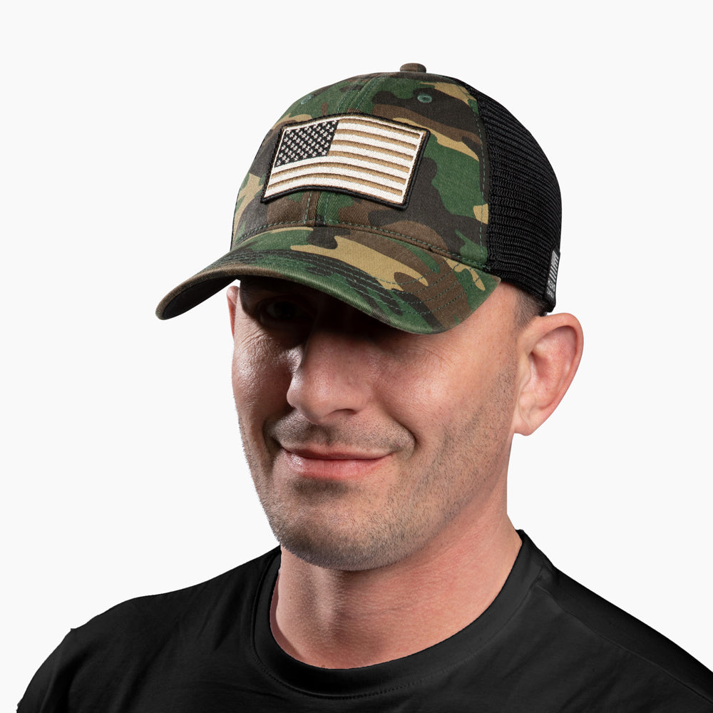 The Hero Company American Flag Hat - Camo - Helps Pair Veterans With A Service Dog or Shelter Dog