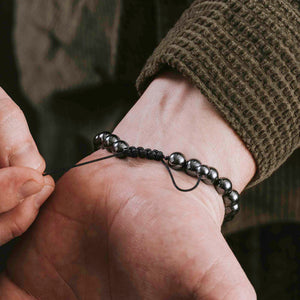 Titanium Stacked Bracelet includes -- Sherman Tank Titanium Track and Buck Magnetic Titanium Bracelets
