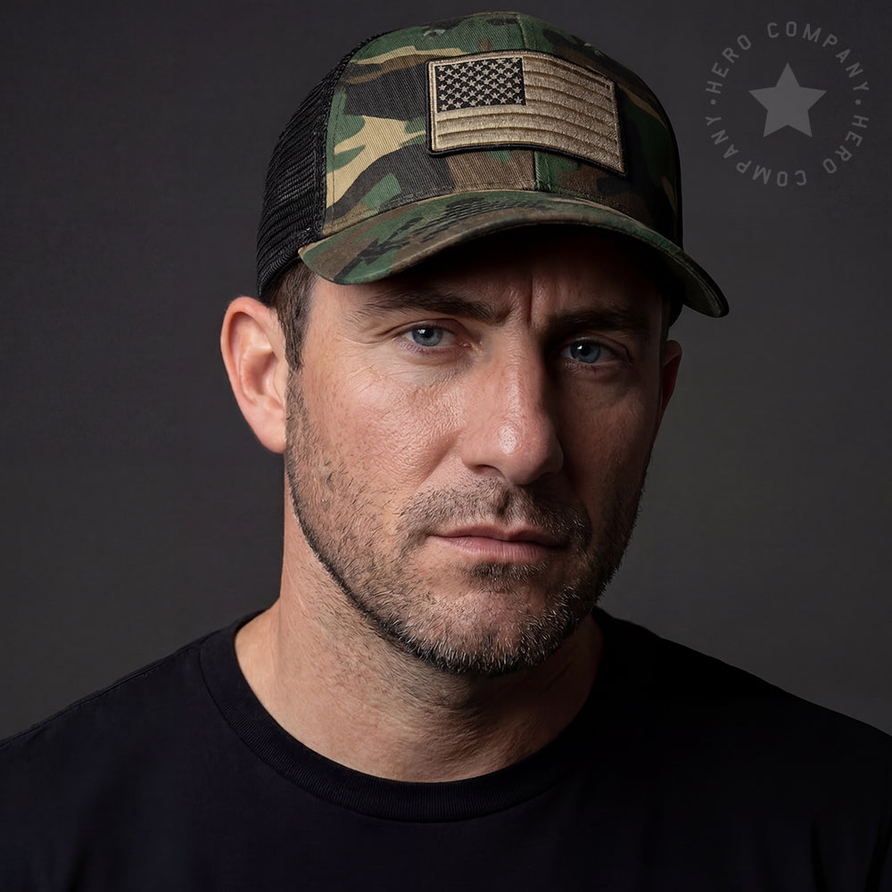 The Hero Company American Flag Hat - Camo - Helps Pair Veterans With A Service Dog or Shelter Dog