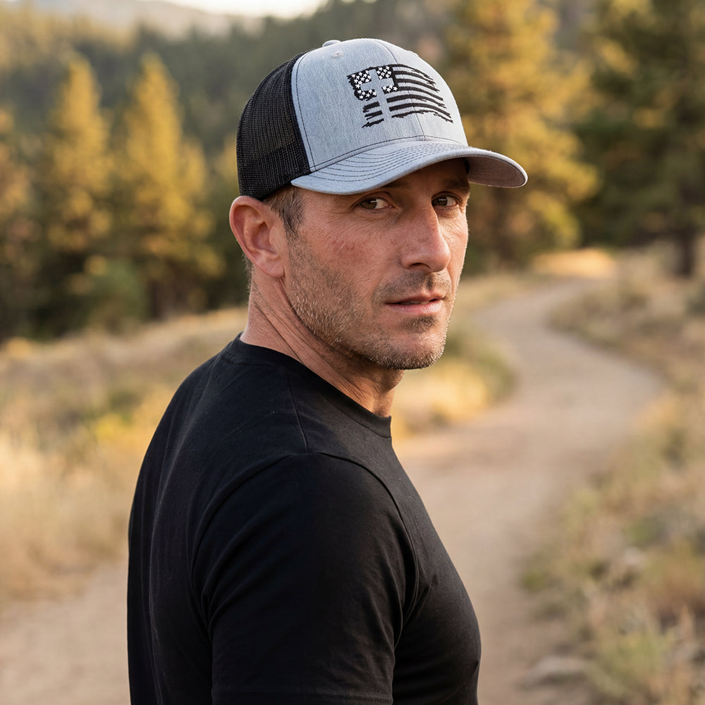 The Hero Company American Flag Cross Hat - Helps Pair Veterans With A Service Dog or Shelter Dog