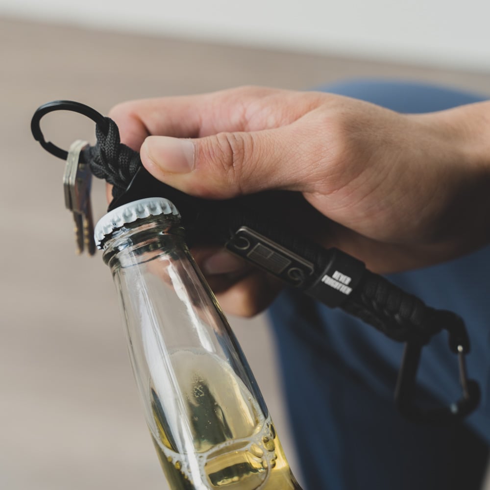 Never Forgotten Paracord Keychain Bottle Opener - Black - The Hero
