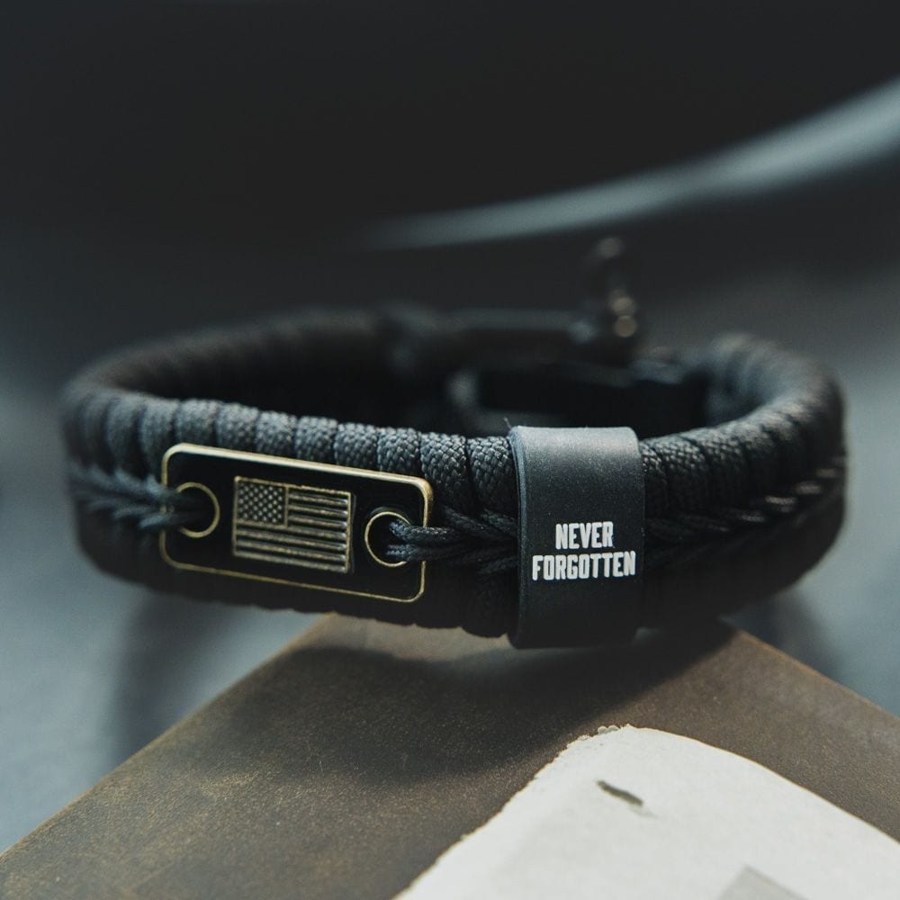 Never Forgotten Black Paracord Bracelet: Helps Pair Veterans With A Se -  The Hero Company